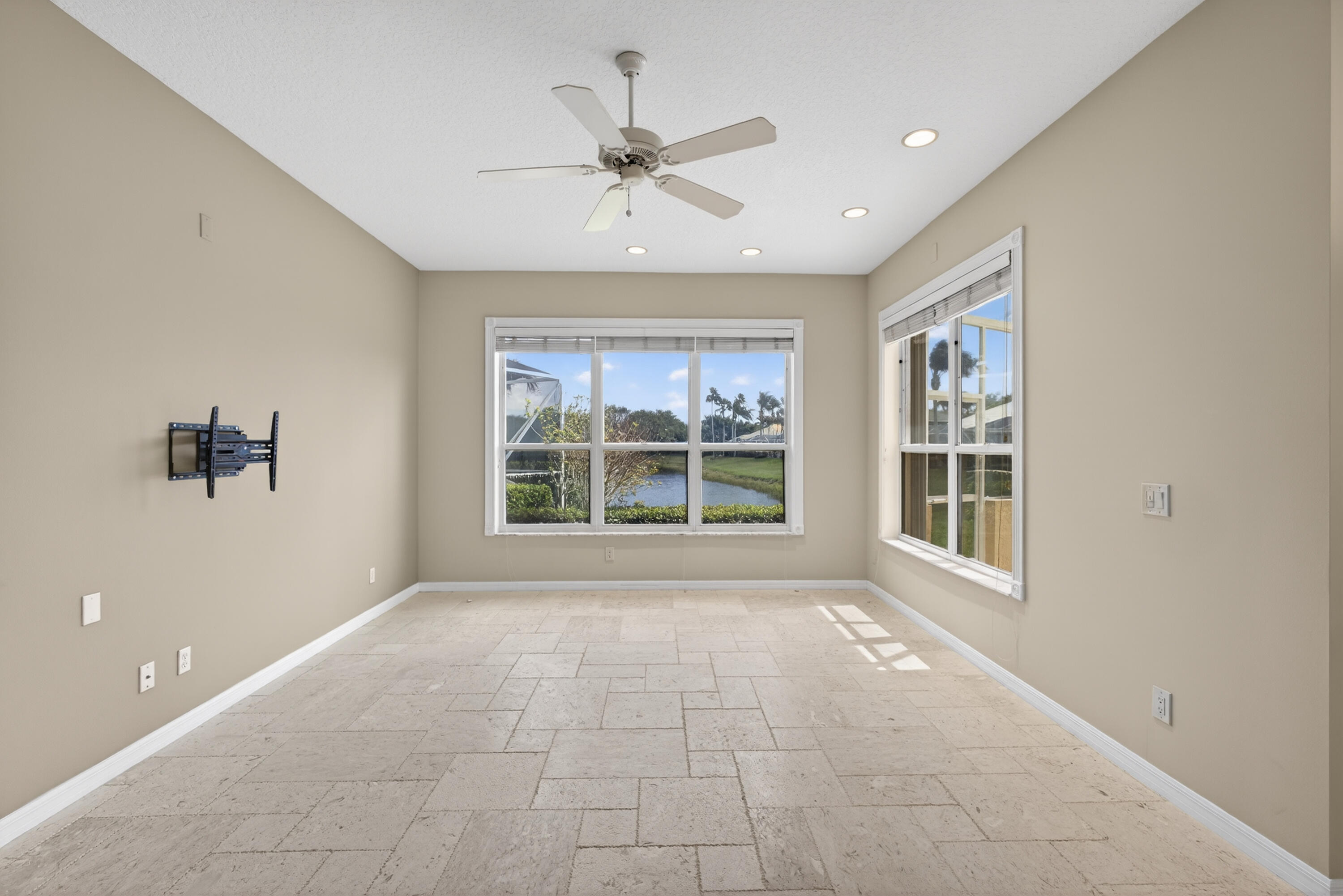 2199 Southwest Brookhaven Way Palm City, FL 34990 - Photo 39 of 119 a view of an empty room with a window