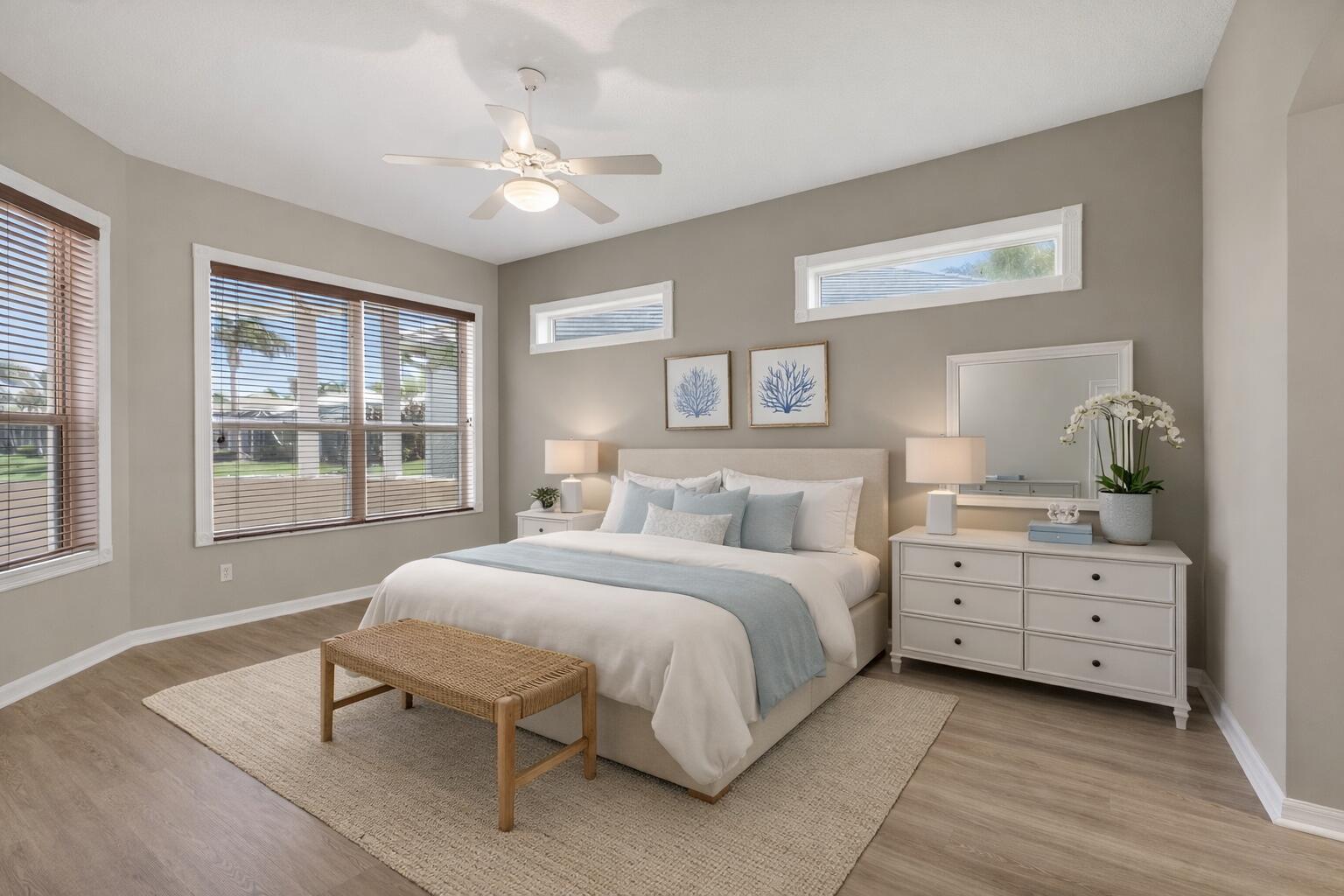 2199 Southwest Brookhaven Way Palm City, FL 34990 - Photo 42 of 119 a bedroom with a bed and windows