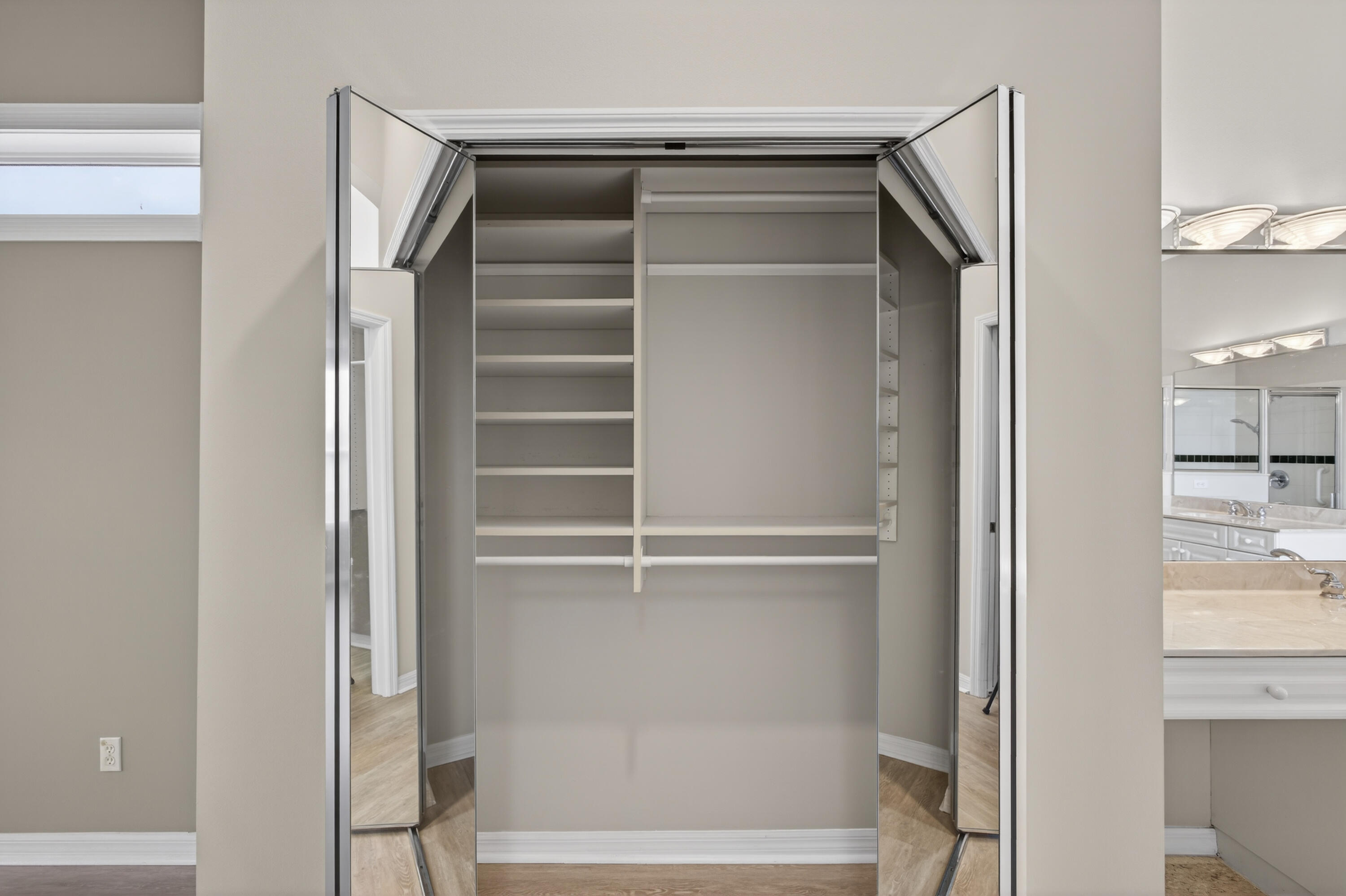 2199 Southwest Brookhaven Way Palm City, FL 34990 - Photo 46 of 119 a view of walk in closet with empty racks