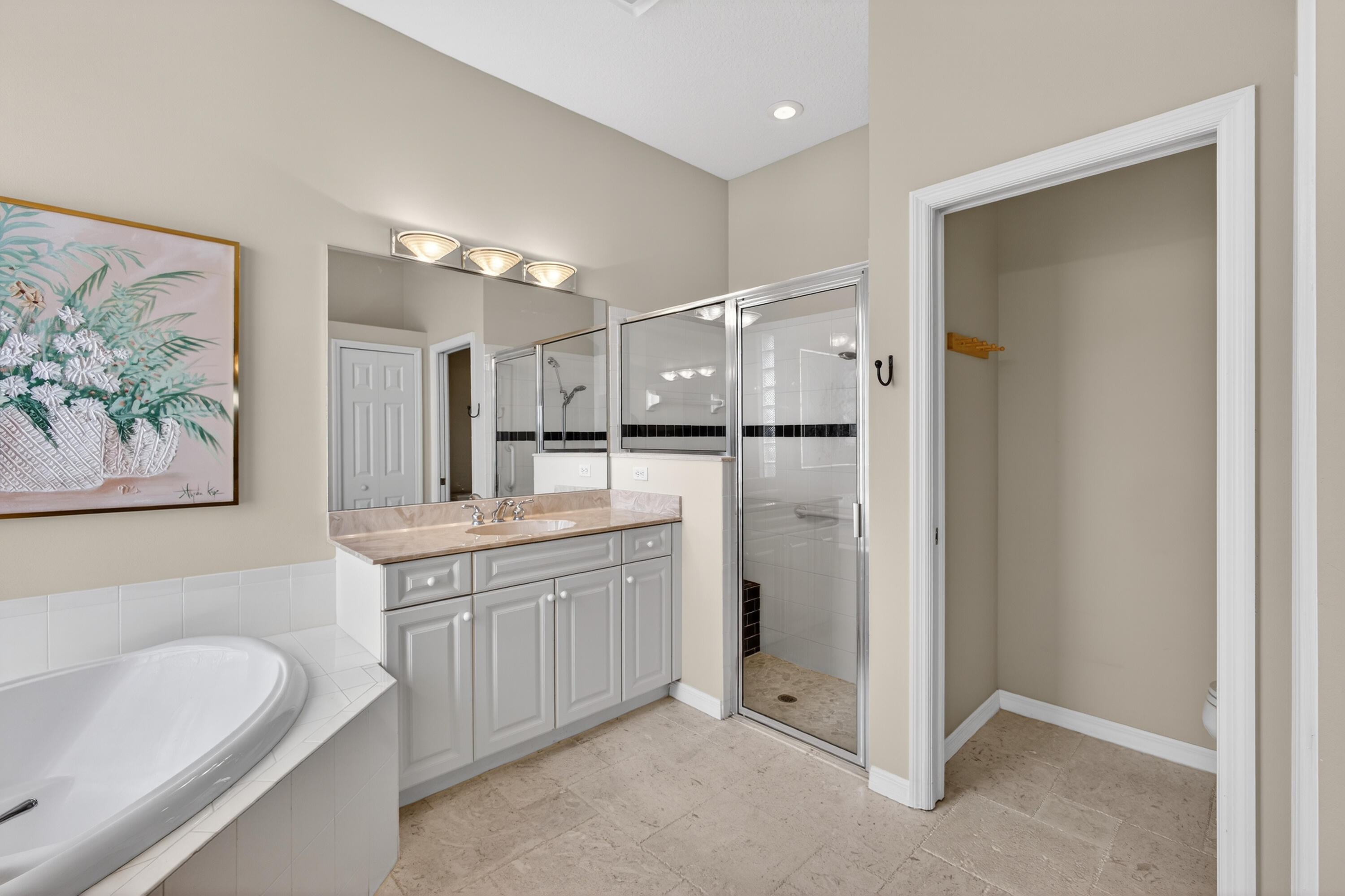 2199 Southwest Brookhaven Way Palm City, FL 34990 - Photo 48 of 119 a bathroom with a double vanity sink mirror and double