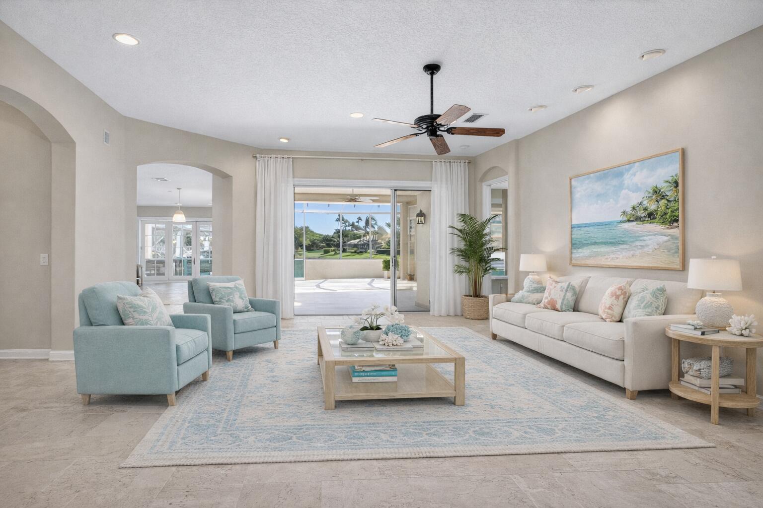 2199 Southwest Brookhaven Way Palm City, FL 34990 - Photo 5 of 119 a living room with furniture and a large window