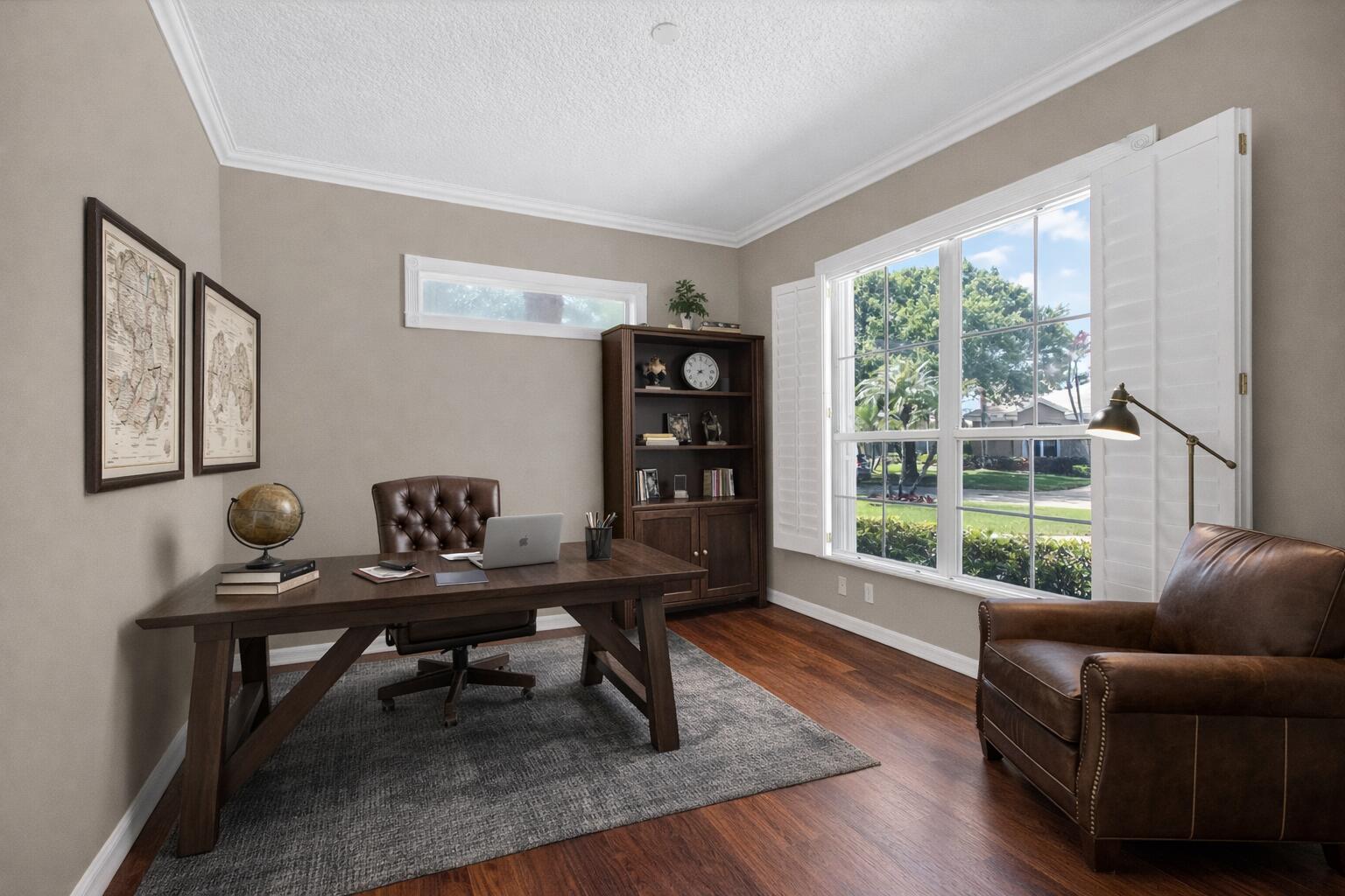 2199 Southwest Brookhaven Way Palm City, FL 34990 - Photo 7 of 119 a living room with furniture a table and a large window