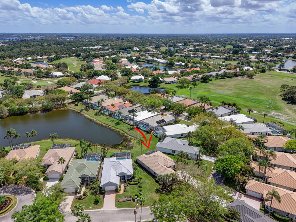 2199 Southwest Brookhaven Way Palm City, FL 34990 - Photo 83 of 119 an aerial view of residential houses with outdoor space
