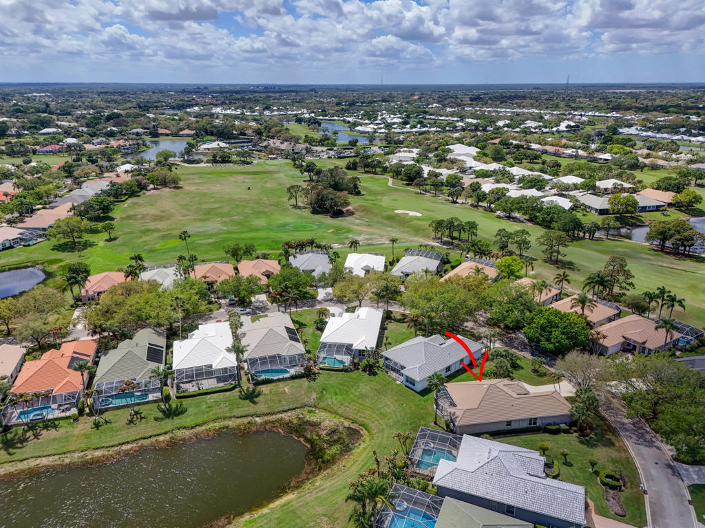 2199 Southwest Brookhaven Way Palm City, FL 34990 - Photo 84 of 119 an aerial view of residential houses with outdoor space and lake view