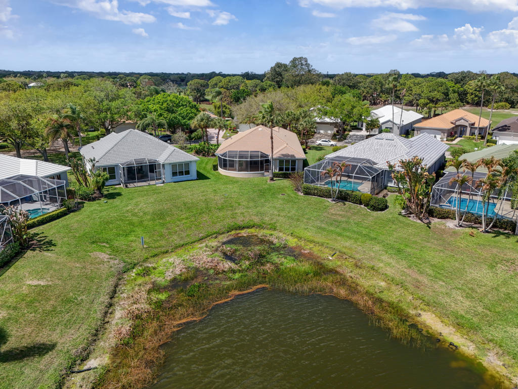 2199 Southwest Brookhaven Way Palm City, FL 34990 - Photo 89 of 119 a view of a house with a yard and sitting area