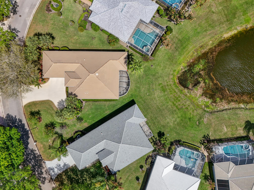 2199 Southwest Brookhaven Way Palm City, FL 34990 - Photo 92 of 119 an aerial view of a residential houses with outdoor space