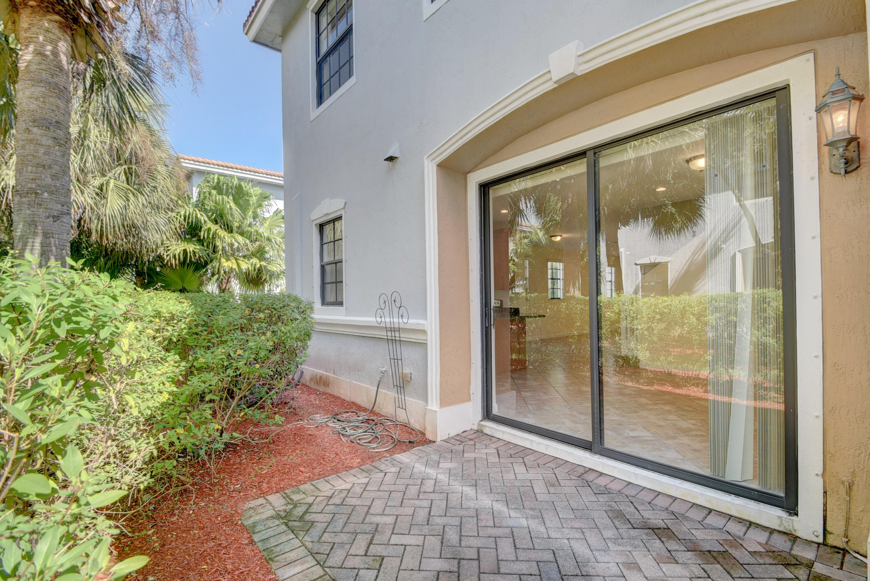 132 Astor Circle Delray Beach, FL 33484 - Photo 36 of 39 back patio