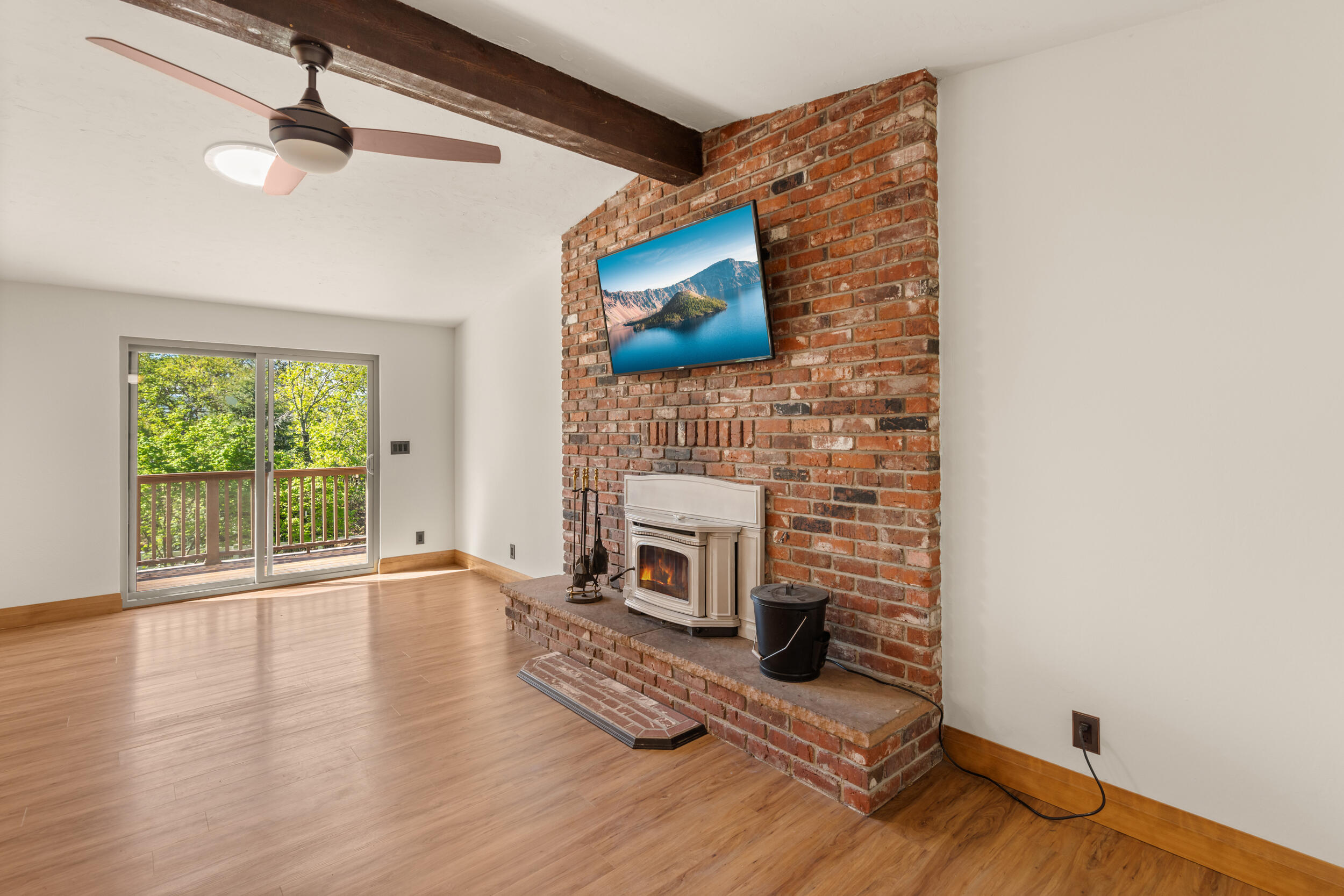 3583 Ross Lane Central Point, OR 97502 - Photo 6 of 52 a living room with furniture and a fireplace