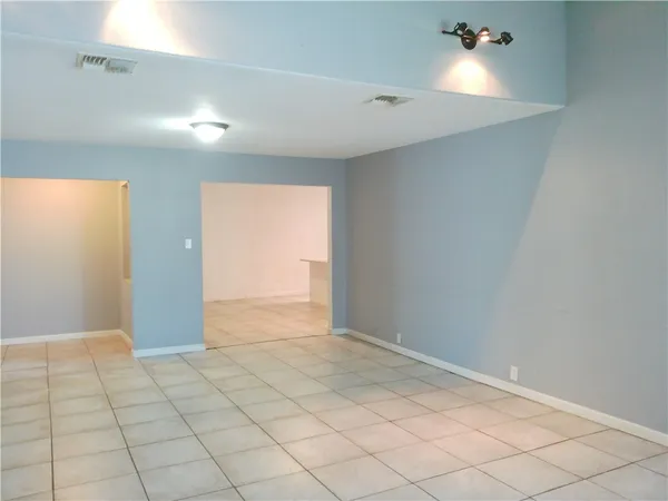 a view of an empty room and window