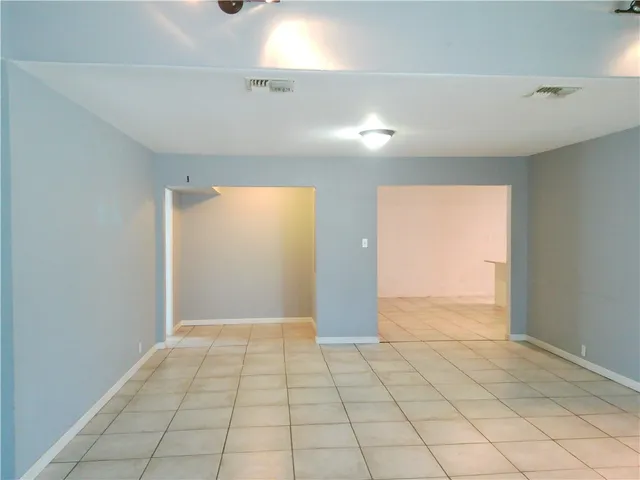 a view of an empty room and window