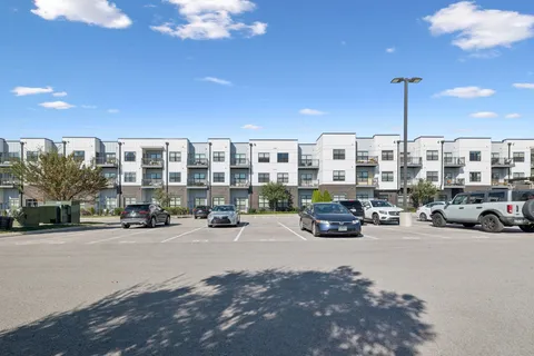 a view of a street in front of a building