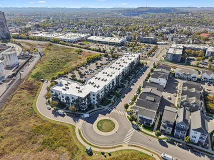 an aerial view of a house with a ocean view