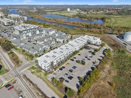 an aerial view of a city with ocean view