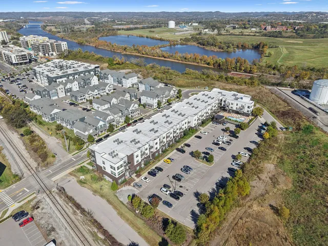 an aerial view of a city with ocean view
