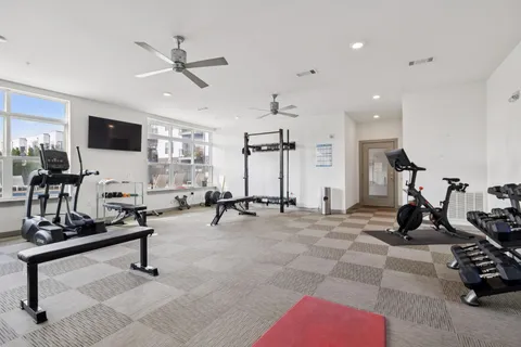 a view of a room with gym equipment