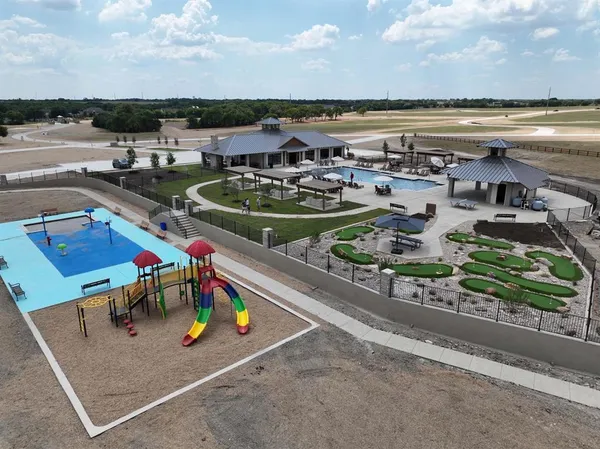 an outdoor space with furniture