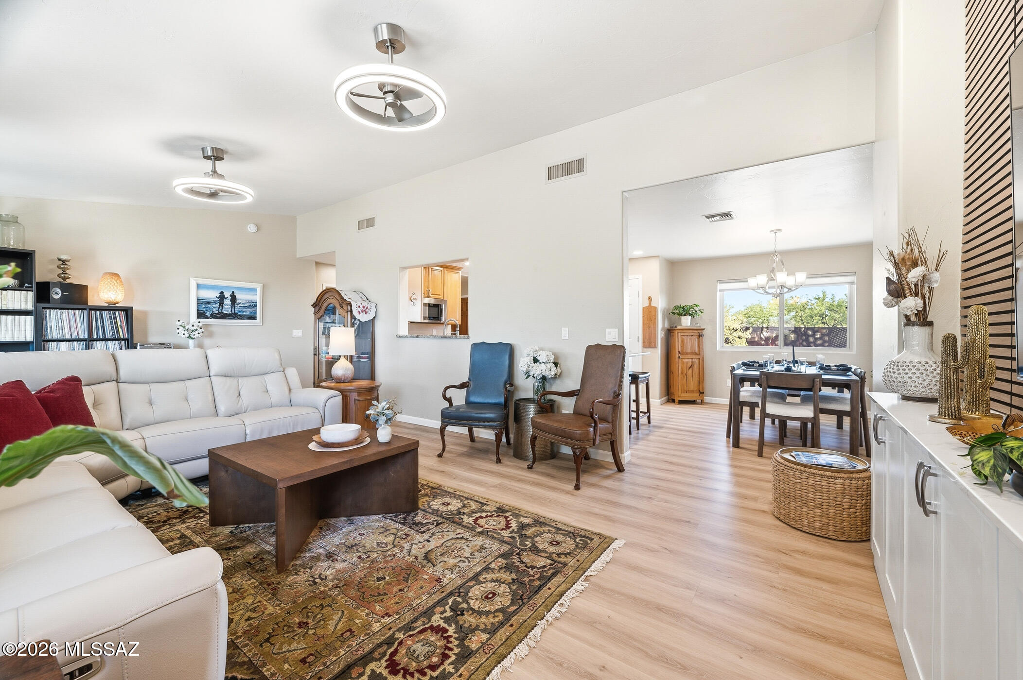 13599 East Rincon Ranch Road Vail, AZ 85641 - Photo 12 of 41 a living room with furniture and a table