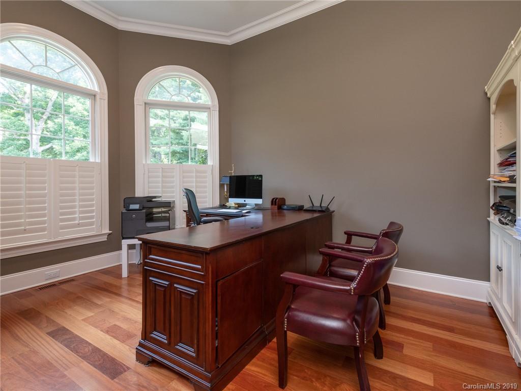 18424 Nantz Road Cornelius, NC 28031 - Photo 11 of 47 a view of a workspace with furniture and a window