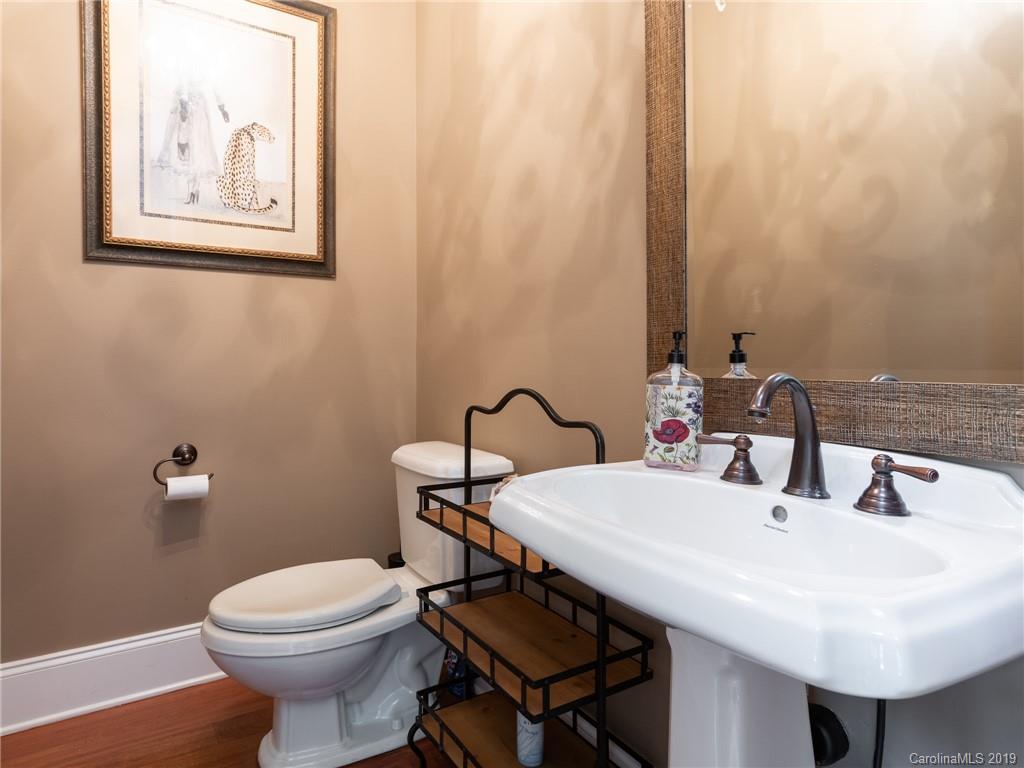 18424 Nantz Road Cornelius, NC 28031 - Photo 12 of 47 a bathroom with a sink and a toilet