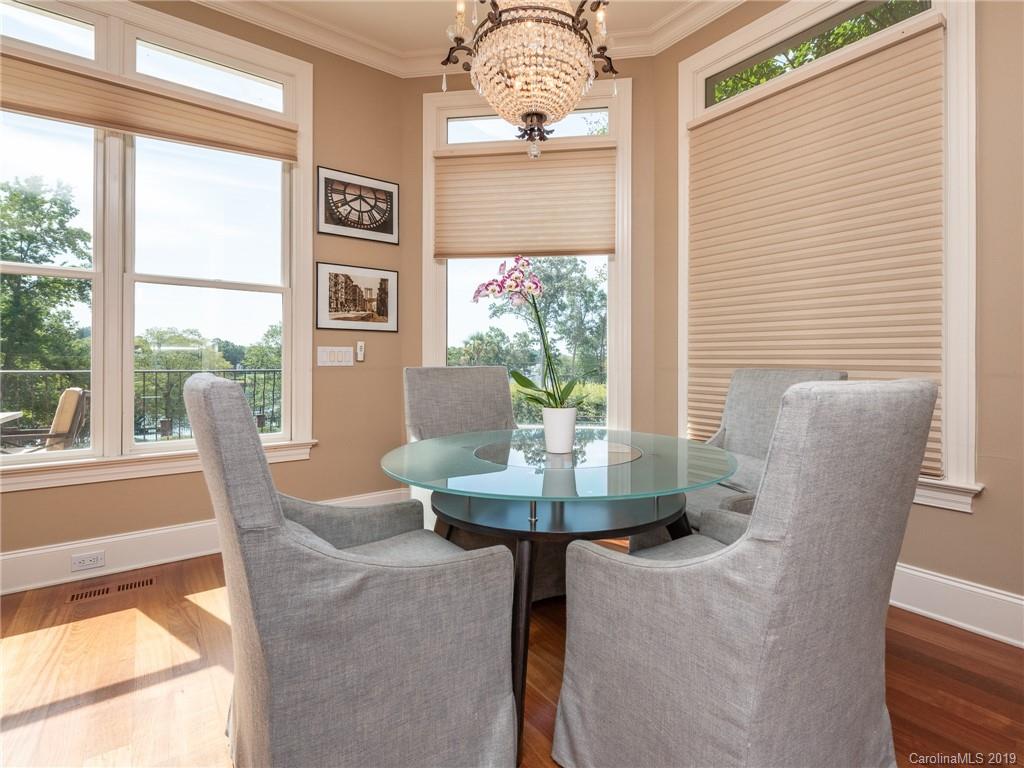 18424 Nantz Road Cornelius, NC 28031 - Photo 21 of 47 a dining room with furniture and windows