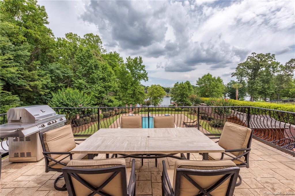 18424 Nantz Road Cornelius, NC 28031 - Photo 22 of 47 a view of balcony with furniture and stove