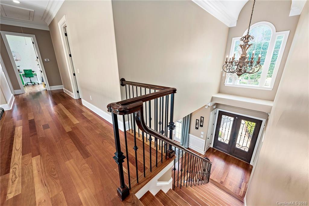 18424 Nantz Road Cornelius, NC 28031 - Photo 25 of 47 a view of entryway and hall with wooden floor