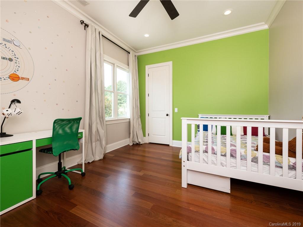 18424 Nantz Road Cornelius, NC 28031 - Photo 29 of 47 a bedroom with furniture and a window