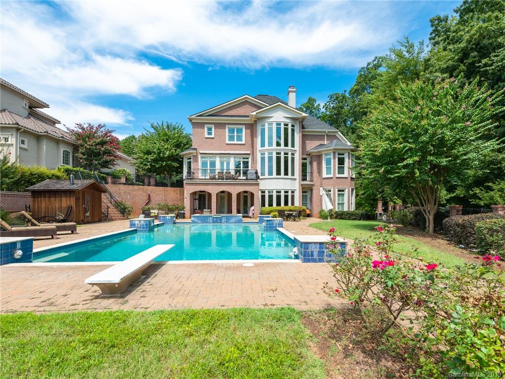 18424 Nantz Road Cornelius, NC 28031 - Photo 45 of 47 a front view of a house with a yard and porch