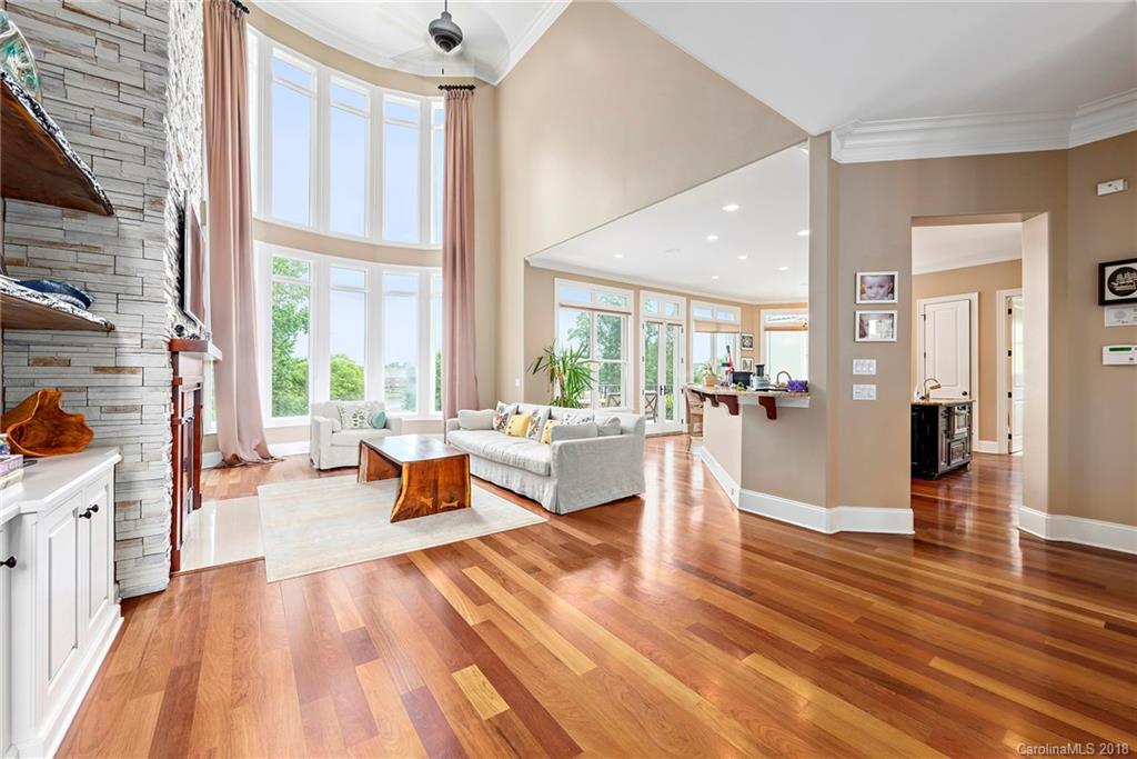 18424 Nantz Road Cornelius, NC 28031 - Photo 6 of 47 a living room with furniture and a large window
