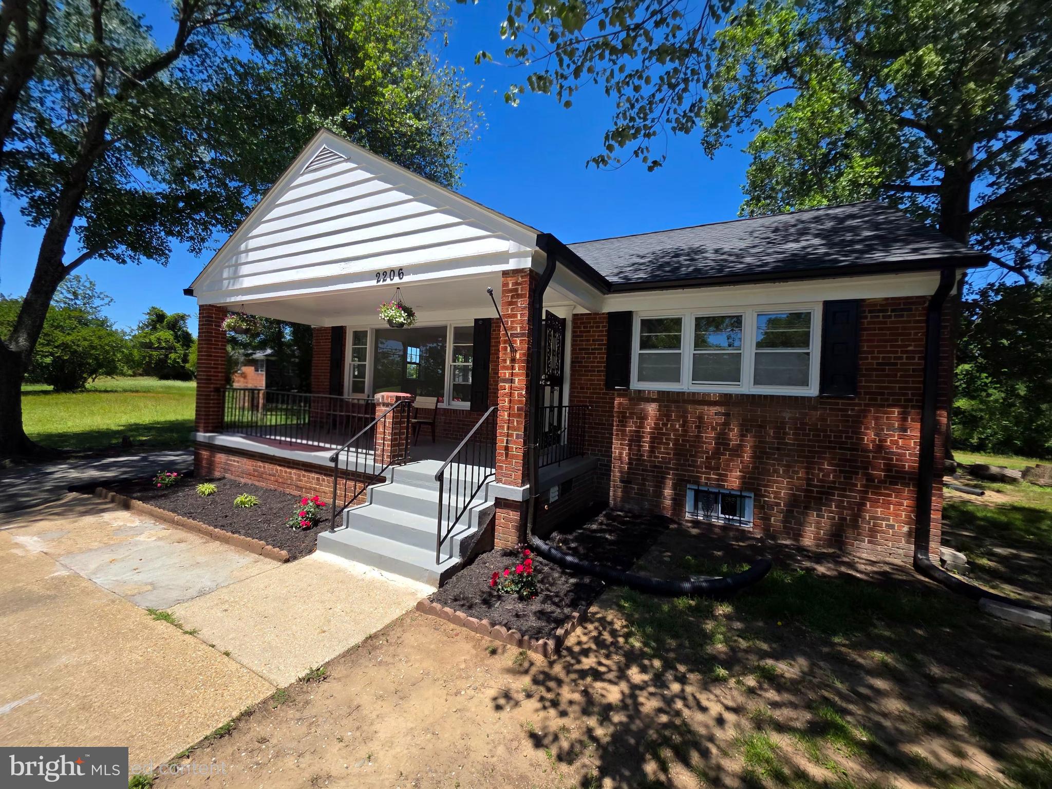 2206 Brinkley Road Fort Washington, MD 20744 - Photo 8 of 78 a view of a house with a patio
