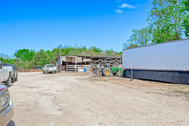 a view of street with parked cars