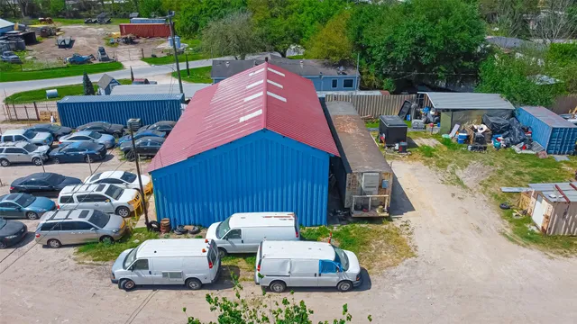 a view of a swimming pool with sitting area