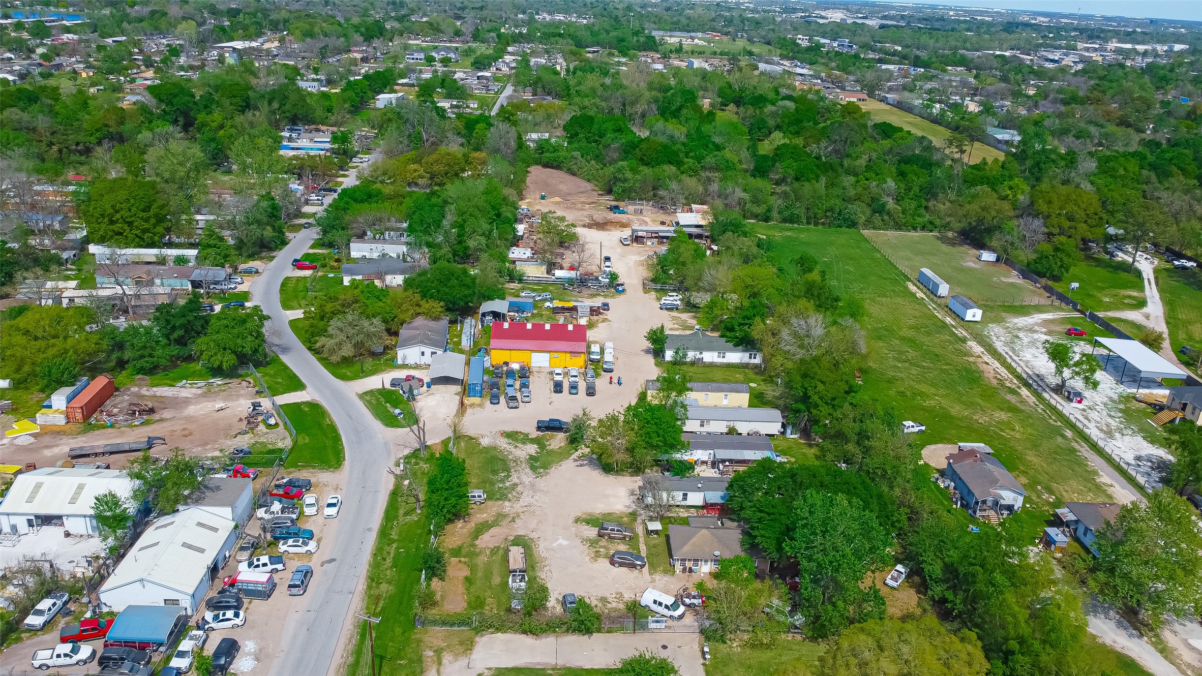 511 Gulf Bank Road, Unit 5 Houston, TX 77037 - Photo 23 of 31 an aerial view of residential houses with outdoor space and trees