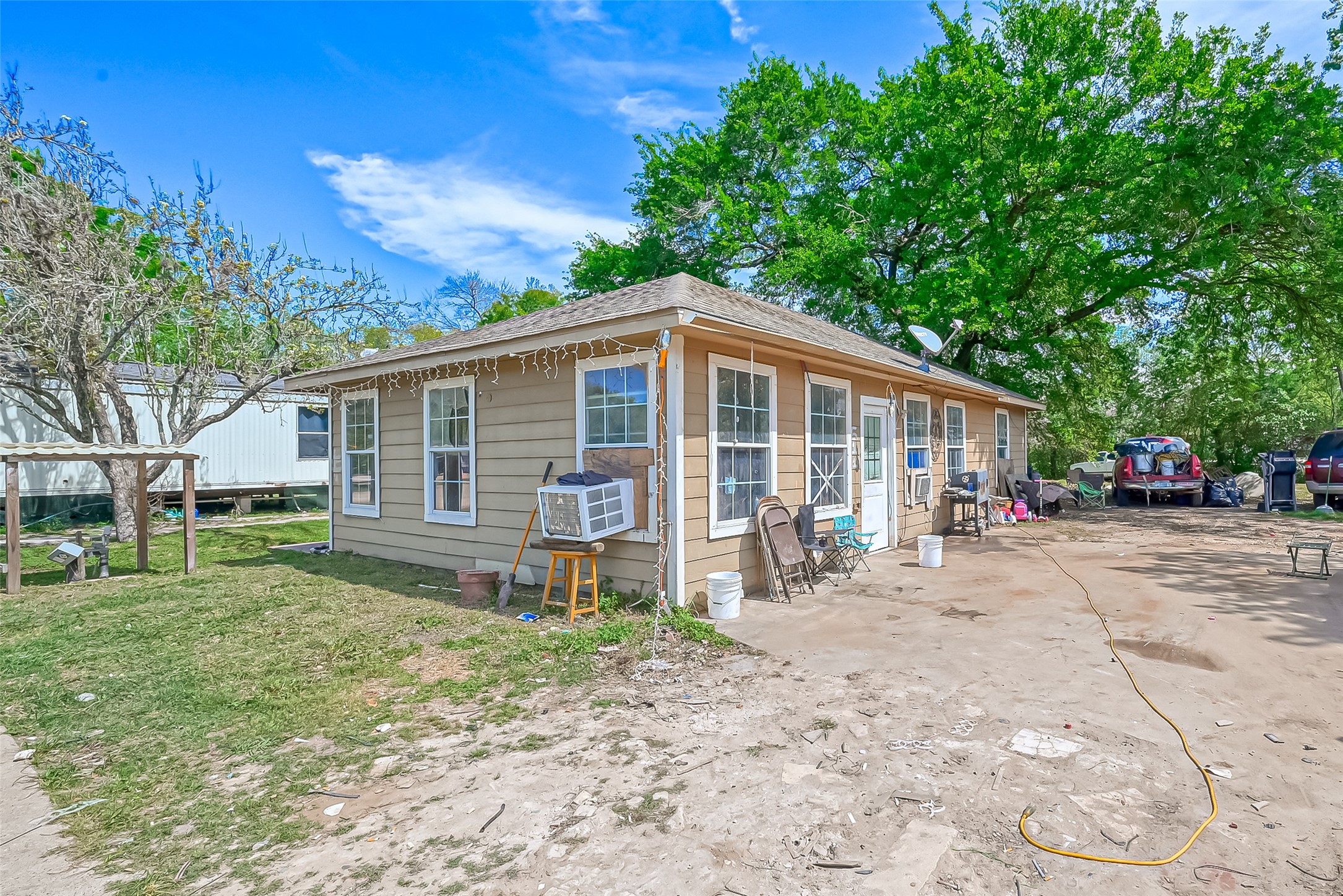 511 Gulf Bank Road, Unit 5 Houston, TX 77037 - Photo 10 of 31 a view of a house with a yard and sitting area