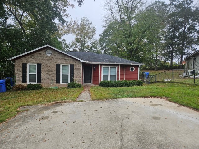 1804 Dallas Court Columbus, GA 31907 - Photo 2 of 50 a front view of a house with a yard and garage
