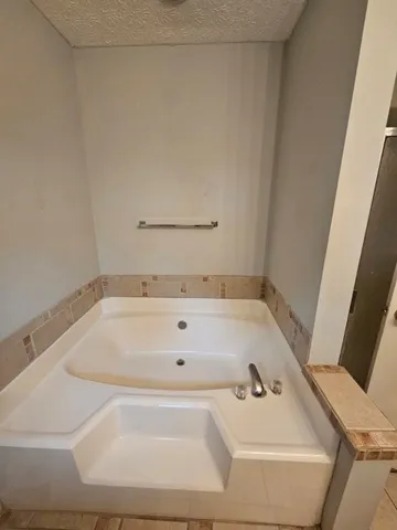 a bathroom with a bathtub
