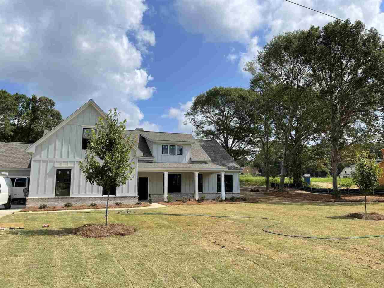 824 Pruitt Road, Unit 5 Bethlehem, GA 30620 - Photo 1 of 1 a front view of house with swimming pool and green space