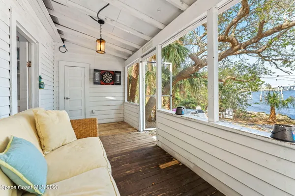 a backyard of a house with large trees