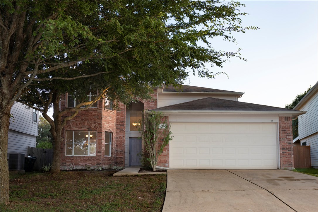 221 Catalpa Drive Kyle, TX 78640 - Photo 1 of 1 a front view of house with yard