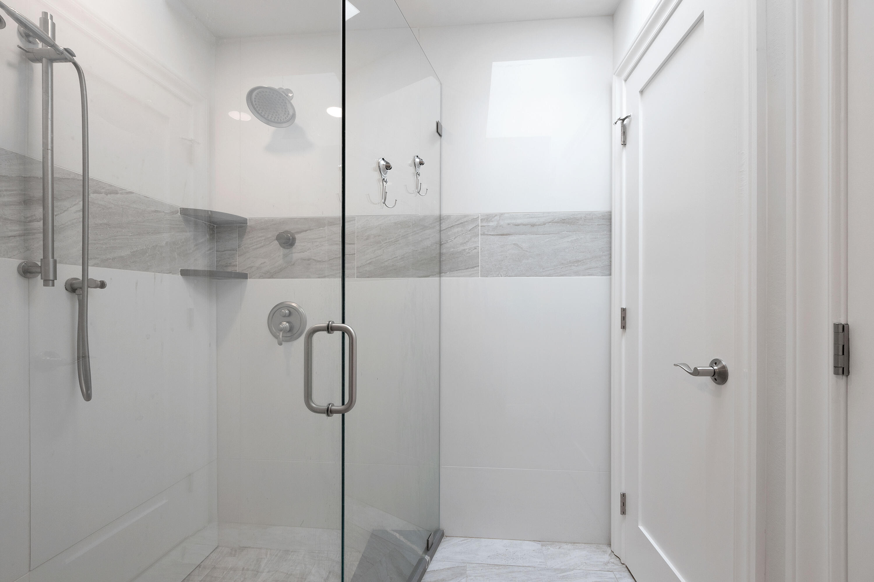 7 Ridge Pointe Drive, Unit C Boynton Beach, FL 33435 - Photo 18 of 29 a bathroom with a shower
