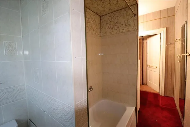 a bathroom with a bathtub