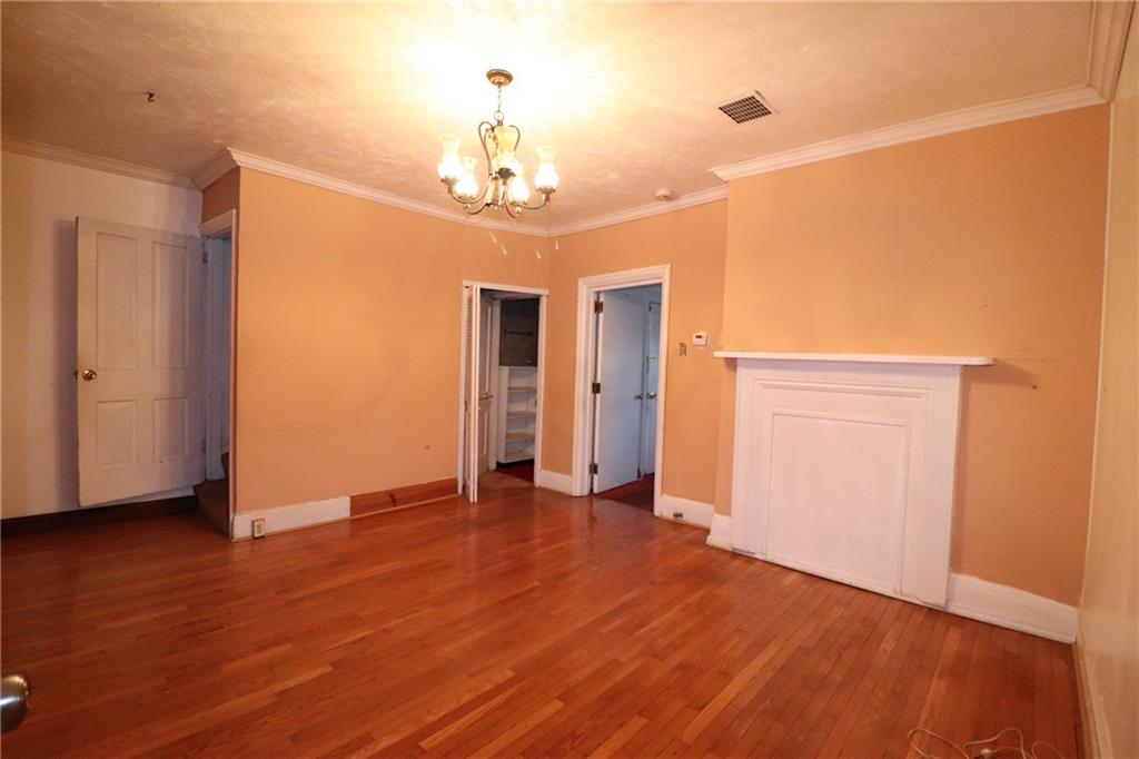 3397 Ridgway Street Pittsburgh, PA 15213 - Photo 4 of 33 a view of a livingroom with a chandelier