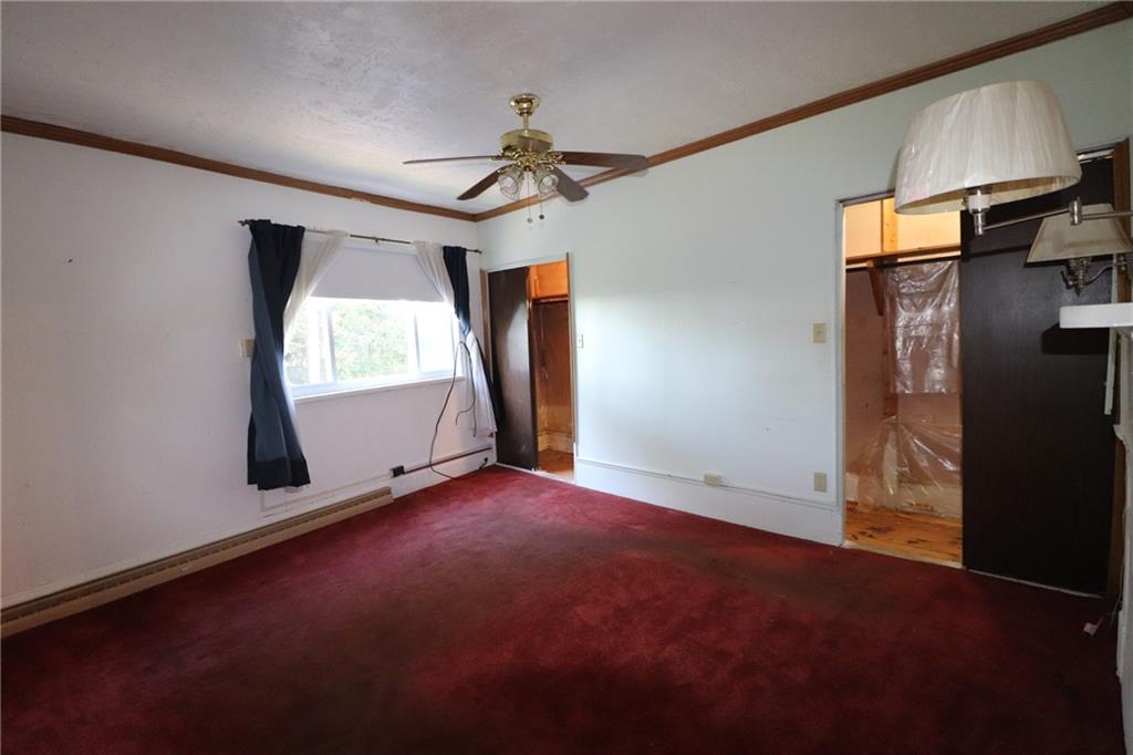 3397 Ridgway Street Pittsburgh, PA 15213 - Photo 6 of 33 an empty room with windows and cabinet