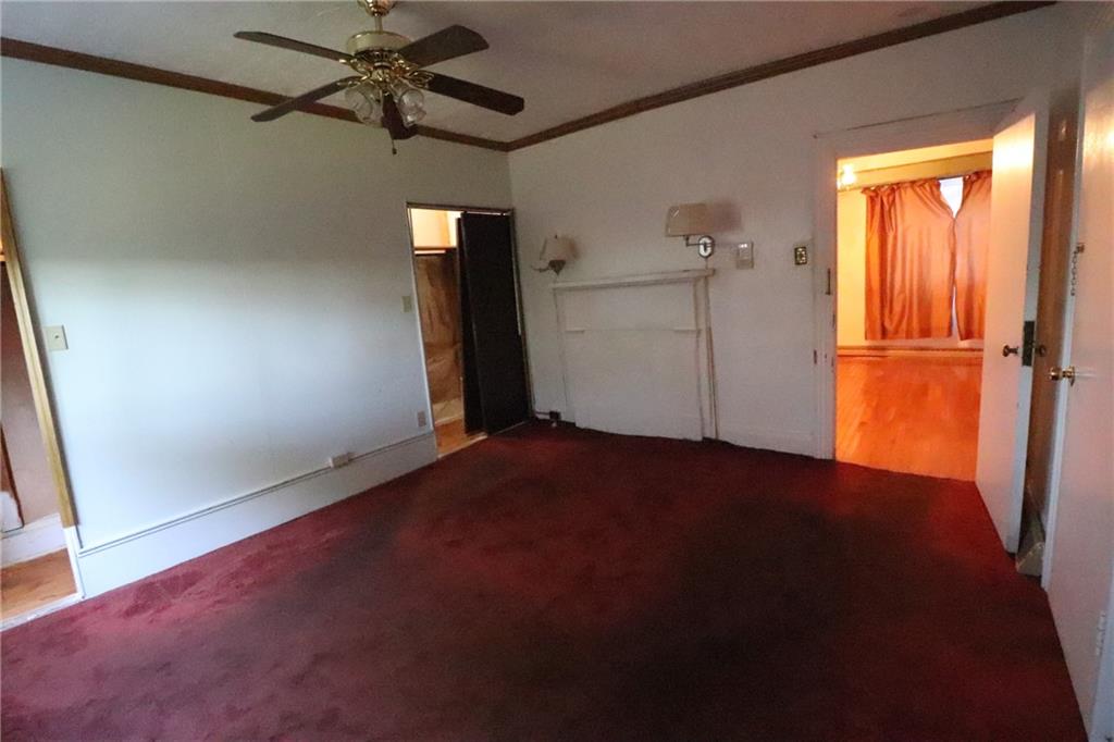 3397 Ridgway Street Pittsburgh, PA 15213 - Photo 7 of 33 an empty room with closet and windows