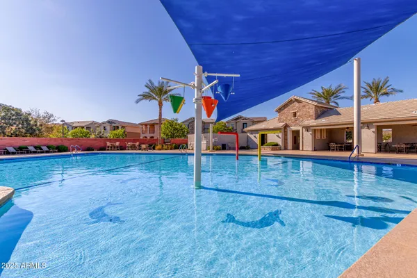 swimming pool view with seating space