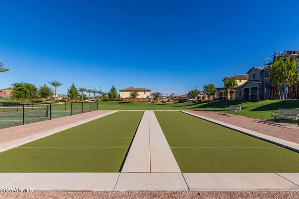 a view of yard with swimming pool and outdoor seating