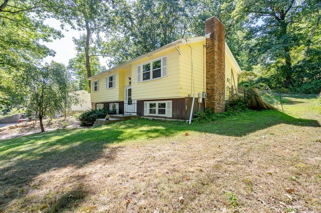 717 Florence Road Northampton, MA 01062 - Photo 21 of 27 a view of a house with a yard