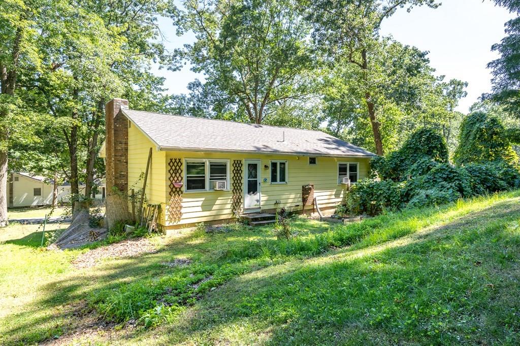 717 Florence Road Northampton, MA 01062 - Photo 23 of 27 a view of a house with a yard and sitting area