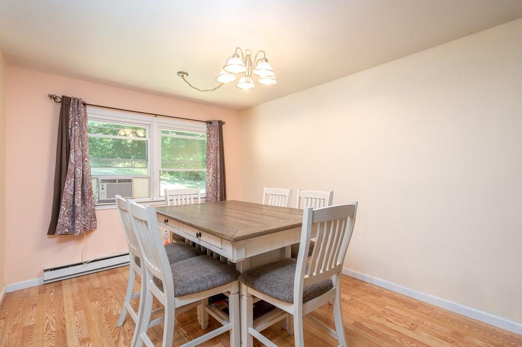 717 Florence Road Northampton, MA 01062 - Photo 8 of 27 a view of a dining room with furniture window and outside view