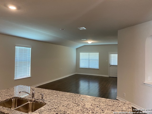 416 Red River Cibolo, TX 78108 - Photo 4 of 12 a view of a hallway to a bedroom with windows